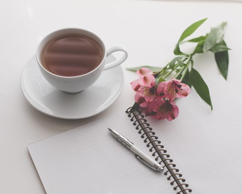 Coffee and note pad